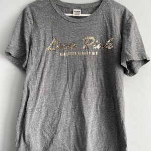 PINK T-shirt with gold sequence.